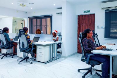 A cross section of staff working at the TGM Education Head office in Lagos
